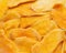 Dehydrated mango as a background. Dried fruits. Natural healthy candy