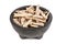 Dehydrated taro snack sticks in a bowl isolated over white