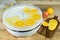 Dehydration machine with orange slices on kitchen table