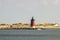 Delaware Breakwater East End Lighthouse  with sailboat