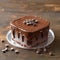 Delectable chocolate cake adorned with velvety soft ganache, sweet treat
