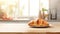 a delectable croissant and a cup of coffee elegantly placed on a kitchen countertop, the scene against a minimalist