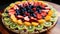 A delectable dessert pizza adorned with fresh kiwi, strawberries, and blueberries.