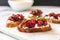 delectable raspberry bruschetta positioned on a marble countertop