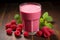 Delectable raspberry milkshake in a glass, a delightful choice for a refreshing breakfast treat