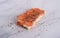 Delectable salmon fillet served on a bed of freshly toasted bread and creamy cheese