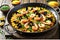 A delectable steaming paella presented from a top-view perspective showcasing a symphony of seafood