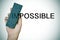 Deleting the word impossible with an eraser