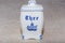 Delft Blue Tea thee container. Famous porcelain souvenirs from Holland/Netherlands.  on textured beige background