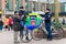 DELFT, the NETHERLANDS - JAN 18, 2014: Two friendly Dutch police officers on a bicycle in a busy square in Delft, the Netherlands