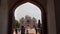 DELHI, INDIA - MARCH 12, 2019: humayun's tomb framed by entrance arch