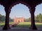DELHI, INDIA - MARCH 15, 2019: a building in the historic red fort framed by an arch