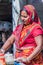 DELHI, INDIA - OCTOBER 22, 2016: Female street cook in the center of Delhi, Indi