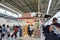 Delica Station kiosk on shinkansen platform in Kyoto Station with crowd of people inside