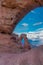 Delicate arch in Arches national Park, viewed through a hole in