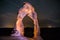 Delicate Arch at Night against Beautiful night sky