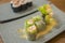 Delicate assorted Japanese sushi rolls on beautiful set up on table in traditional healthy Asian food and creative oriental dining