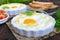 Delicate baked egg Orsini eggs in the cloud. French breakfast