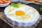 Delicate baked egg Orsini eggs in the cloud. French breakfast