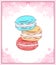 Delicate card with colored drawing of macaroon