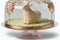 delicate decorated easter lamb cake on transparent stand