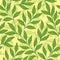 Delicate design of tender branches and leaves mosaic of leaves of different shades of green. vector seamless pattern