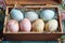 Delicate Easter eggs nestled in craft box, perfect Easter present