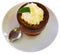 Delicate flan dessert is served in miniature bowl decorated with leaf of fragrant fresh mint