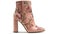 The delicate floral embroidery on these high heeled boots provides a feminine touch to an edgy boot created with Generative AI