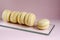 Delicate French macaroons on glass.