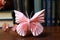 delicate origami butterfly on flower