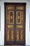 Delicate Peranakan wood carved door with gold inlay Penang Malaysia