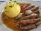 Delicately roasted duck breast fillet with potato dumpling