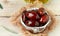 Delicatessen Greek Kalamata black red glossy olives in ceramic bowl