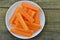 Delicios carrot, kohlrabi and peanuts on wooden background.