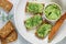 Delicious appetizer -butter with dill greens on rye bread with sunflower seeds