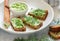 Delicious appetizer -butter with dill greens on rye bread with sunflower seeds