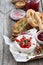 Delicious appetizers - camembert with berry jam, toast and fruit