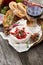 Delicious appetizers for wine - camembert, berry jam, toast