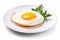 Delicious and appetizing fried egg on a white plate isolated on a clean white background