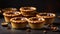 Delicious, appetizing tartlets with jam on a dark background