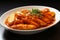 Delicious and appetizing tteokbokki. spicy rice cake - authentic south korean dish for food lovers
