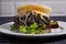 Delicious arepa stuffed with white cheese, fried plantain, roasted meat and black beans