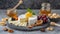 Delicious artisan cheese dish with honey and dried fruits