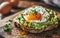 Delicious avocado toast with a perfectly cooked sunny-side up egg