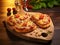 Delicious baked pizzas with various vegetables and cheese, on wooden board on the kitchen table