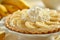 Delicious banana cream pie on a white plate