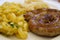 delicious bavarian fried sausage with potato salad and sauerkraut