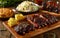 Delicious BBQ ribs served with coleslaw, cornbread, and sauces on a rustic table setting.