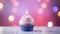 Delicious birthday cupcake with tiny candles on empty light table on bright magical bokeh background